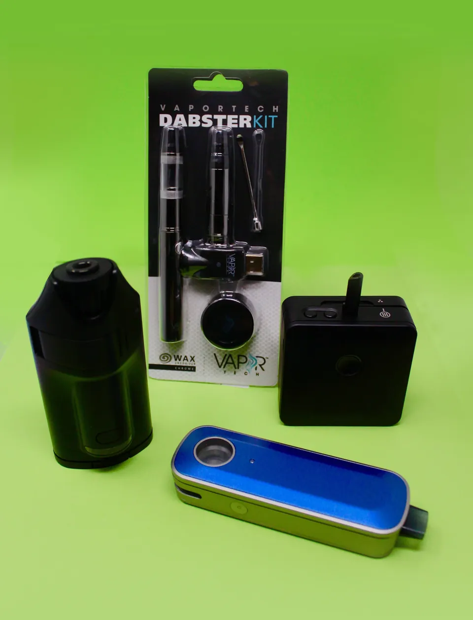 Dabster kit, portable vaporizers and dab accessories on a lime green backdrop